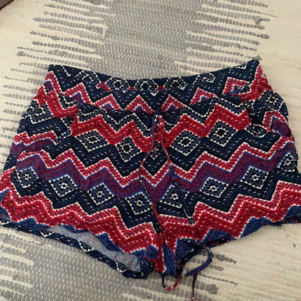 Red, black, blue and white flowy print shorts